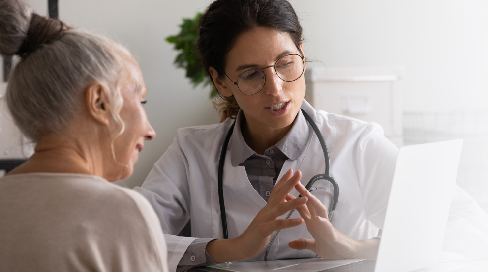 Male scientist looking at a fluid sample supporting Biron's expertise and promise regarding genetic tests 